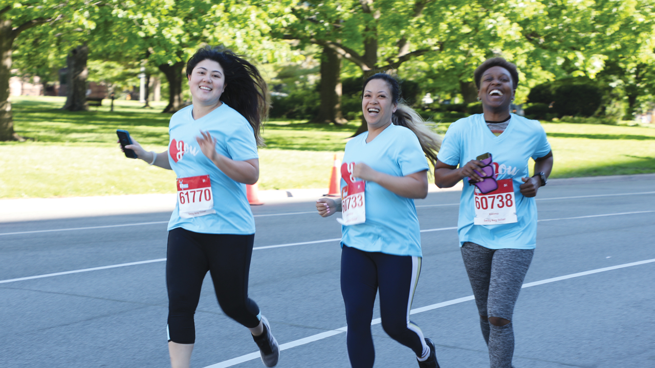 three runners participating in the 2021 Shoppers Drug Mart LOVE YOU Run for Women outdoors